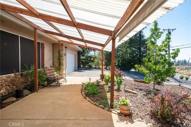 6354 Berkshire Ave, Paradise, CA 95969 - view of patio / terrace with concrete driveway and a garage