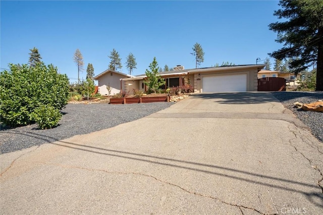 6354 Berkshire Ave, Paradise, CA 95969 - ranch-style house featuring concrete driveway and a garage