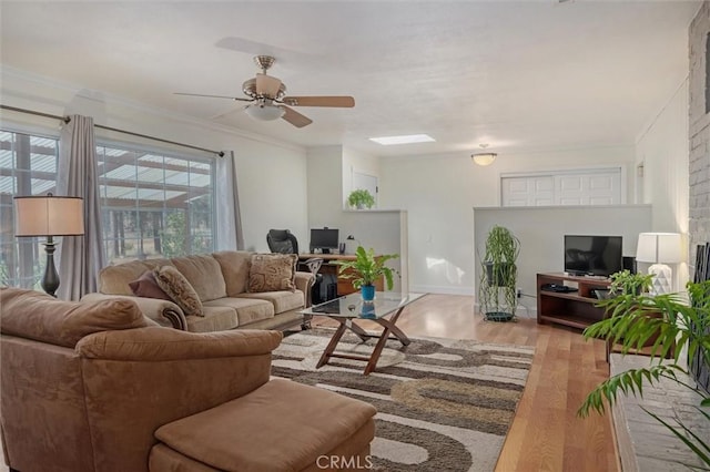 6354 Berkshire Ave, Paradise, CA 95969 - living area with ceiling fan, wood finished floors, and crown molding