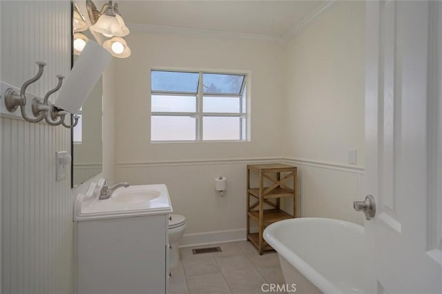 6354 Berkshire Ave, Paradise, CA 95969 - full bath with a freestanding tub, vanity, a wainscoted wall, ornamental molding, and tile patterned flooring