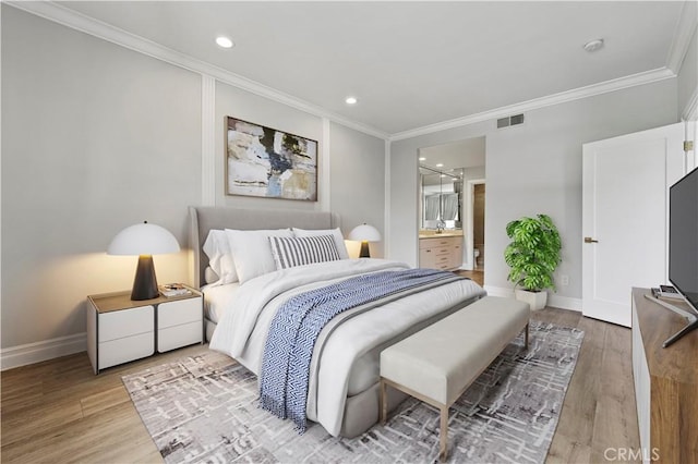 390 S Sepulveda Blvd Unit 105, Los Angeles, CA 90049 - bedroom with crown molding, light wood finished floors, recessed lighting, and ensuite bath