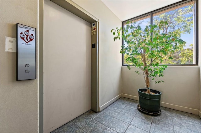 390 S Sepulveda Blvd Unit 105, Los Angeles, CA 90049 - unfurnished sunroom with elevator