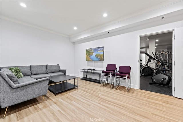 390 S Sepulveda Blvd Unit 105, Los Angeles, CA 90049 - living room with wood finished floors, ornamental molding, and recessed lighting