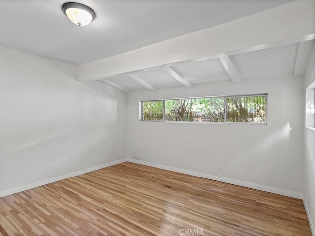 13510 Valleyheart Dr N, Sherman Oaks, CA 91423 - unfurnished room with beamed ceiling and wood finished floors