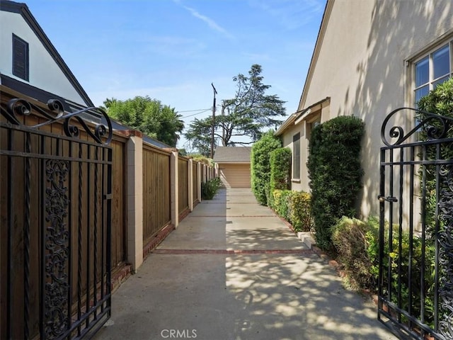 13510 Valleyheart Dr N, Sherman Oaks, CA 91423 - view of side of home with a gate and stucco siding
