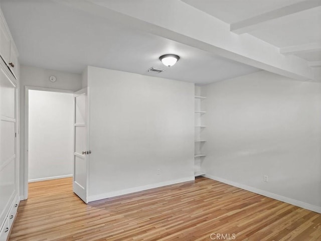 13510 Valleyheart Dr N, Sherman Oaks, CA 91423 - empty room with light wood finished floors and a smoke detector