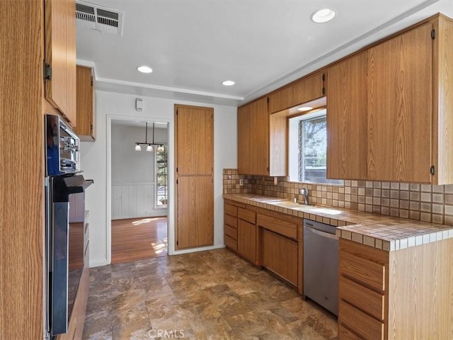 13510 Valleyheart Dr N, Sherman Oaks, CA 91423 - kitchen featuring stainless steel dishwasher, tile countertops, oven, decorative backsplash, and brown cabinetry