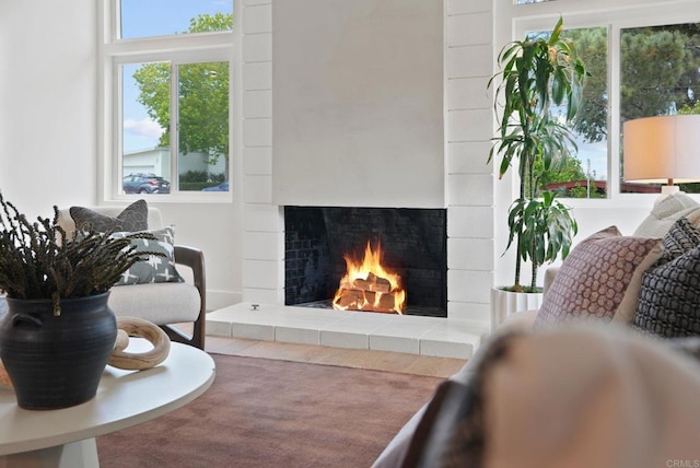 8602 Kilbourn Dr, La Jolla, CA 92037 - living area featuring a fireplace and wood finished floors