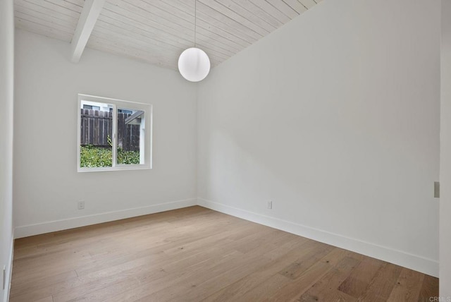 8602 Kilbourn Dr, La Jolla, CA 92037 - spare room featuring light wood-style flooring and a wood ceiling with exposed beams