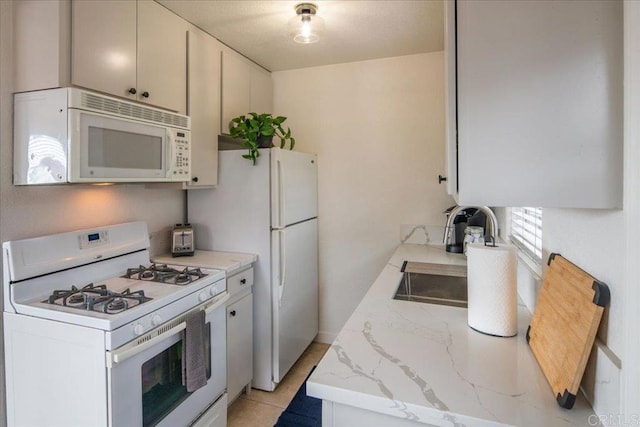 260406 Juan St, San Diego, CA 92110 - kitchen featuring white appliances and a sink