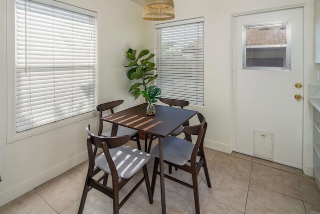 260406 Juan St, San Diego, CA 92110 - dining space with baseboards and light tile patterned floors