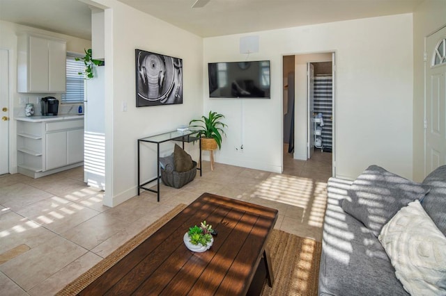 260406 Juan St, San Diego, CA 92110 - living area with light tile patterned flooring and baseboards