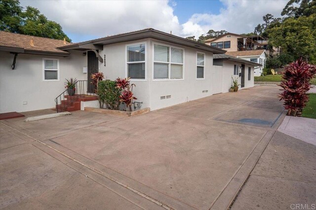 260406 Juan St, San Diego, CA 92110 - view of front of house featuring stucco siding and crawl space