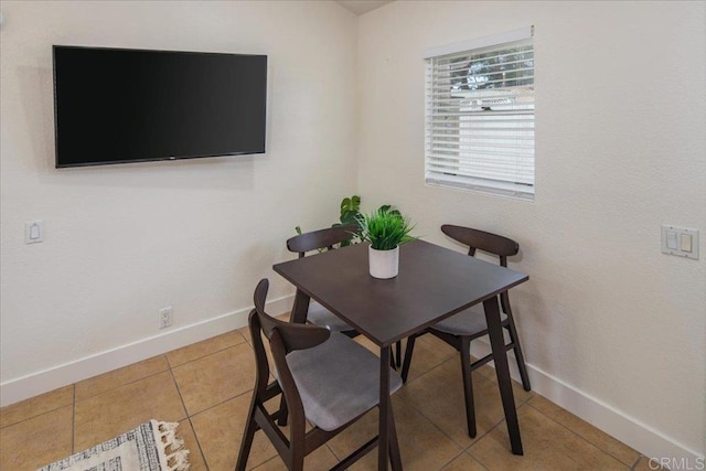 260406 Juan St, San Diego, CA 92110 - tiled dining area featuring baseboards