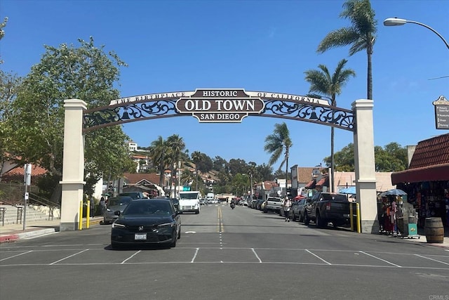 260406 Juan St, San Diego, CA 92110 - view of asphalt road with street lighting and curbs