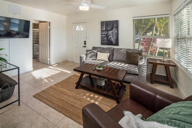 260406 Juan St, San Diego, CA 92110 - tiled living room with a ceiling fan and baseboards