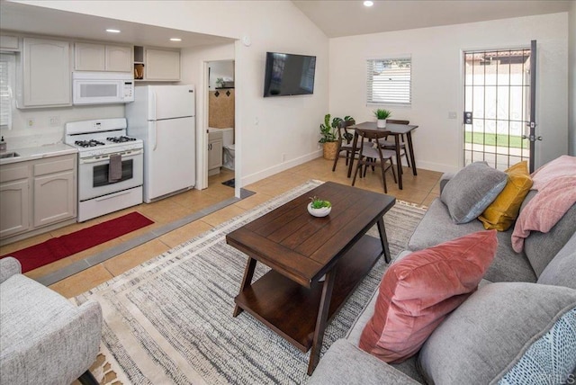 260406 Juan St, San Diego, CA 92110 - living area featuring lofted ceiling, light tile patterned flooring, and recessed lighting