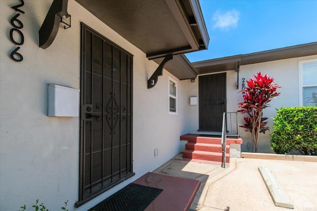 260406 Juan St, San Diego, CA 92110 - property entrance featuring stucco siding