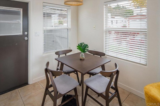 260406 Juan St, San Diego, CA 92110 - dining space with baseboards and light tile patterned floors