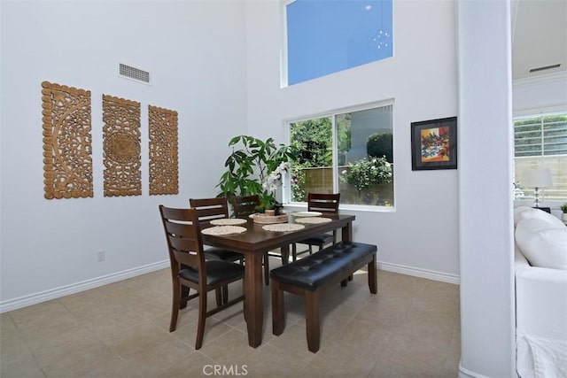 49 Mountain Laurel Way, Azusa, CA 91702 - dining area with a high ceiling and baseboards