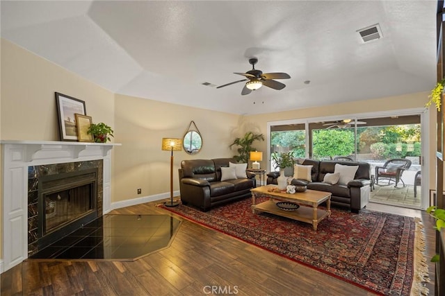 25 Misty Way, Chico, CA 95926 - living room featuring a ceiling fan, wood finished floors, a high end fireplace, and a raised ceiling