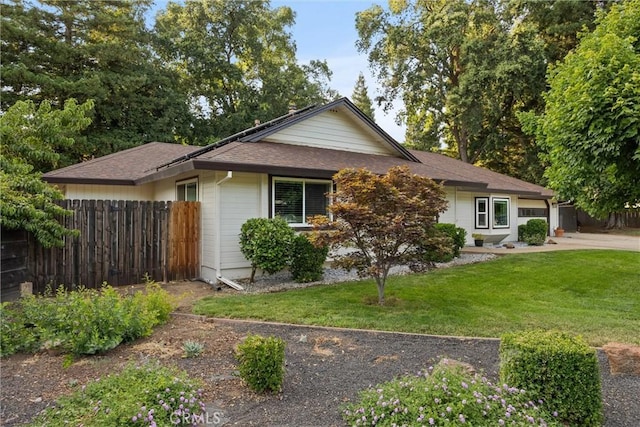 25 Misty Way, Chico, CA 95926 - view of front facade featuring roof with shingles, an attached garage, and driveway