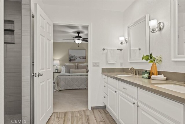 25 Misty Way, Chico, CA 95926 - full bath featuring double vanity, ensuite bath, a ceiling fan, and wood finished floors