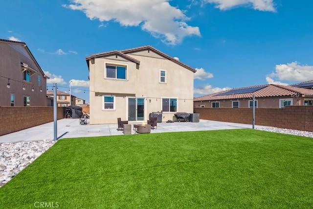 13343 Macaw Pl, Victorville, CA 92395 - rear view of property with a patio, a fenced backyard, and stucco siding