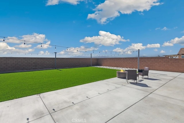 13343 Macaw Pl, Victorville, CA 92395 - fenced backyard with a patio