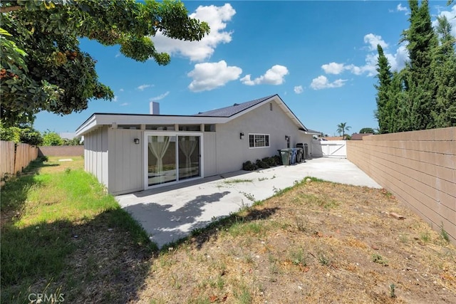 1106 W Bellbrook St, Covina, CA 91722 - rear view of property with a fenced backyard, a patio area, and a gate