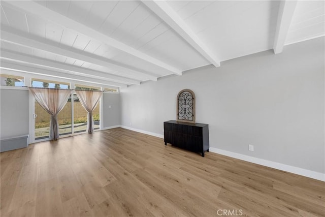 1106 W Bellbrook St, Covina, CA 91722 - unfurnished living room with beam ceiling and wood finished floors
