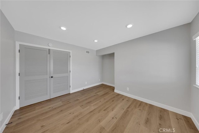 1106 W Bellbrook St, Covina, CA 91722 - unfurnished bedroom featuring wood finished floors, recessed lighting, and a closet