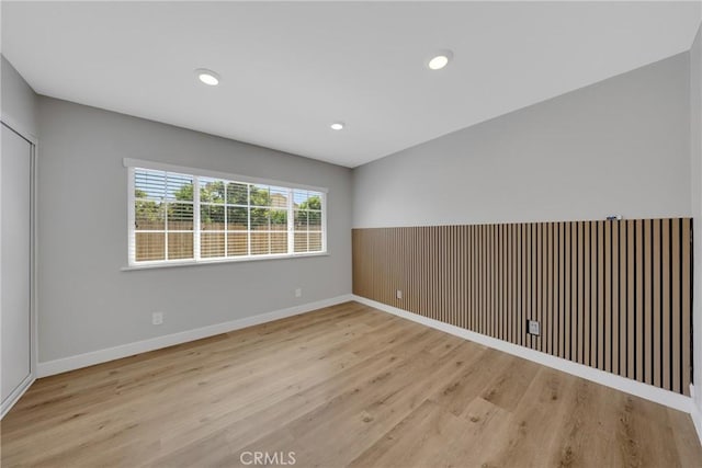 1106 W Bellbrook St, Covina, CA 91722 - empty room featuring wood finished floors and recessed lighting