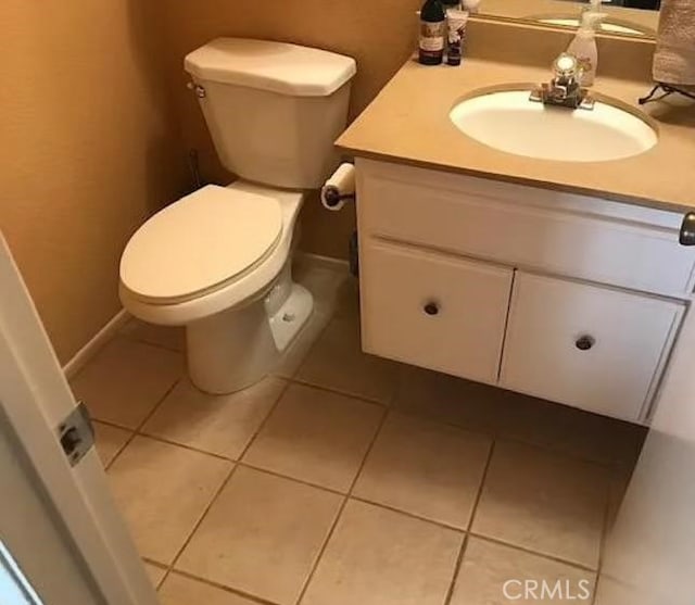 19545 Sherman Way Unit 44, Reseda, CA 91335 - half bath featuring vanity and tile patterned flooring