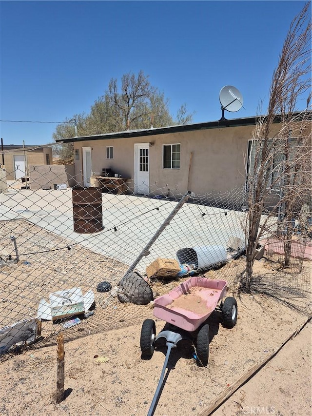 45146 Fairview Rd, Newberry Springs, CA 92365 - rear view of house featuring a patio and stucco siding