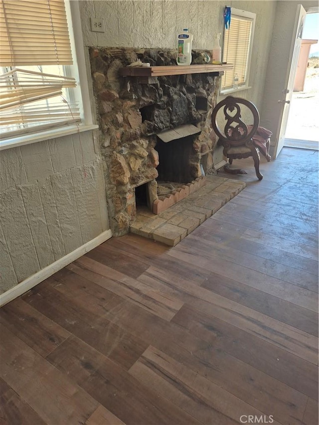 45146 Fairview Rd, Newberry Springs, CA 92365 - detailed view of wood finished floors and a stone fireplace