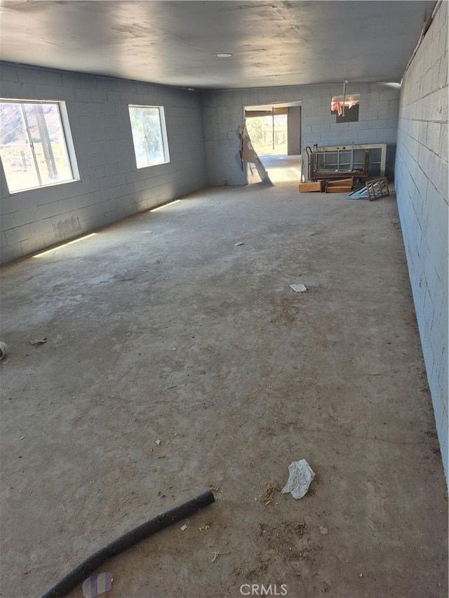 45146 Fairview Rd, Newberry Springs, CA 92365 - empty room with concrete block wall and unfinished concrete flooring