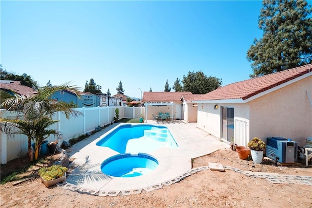 3473 Yankee Cir, Riverside, CA 92503 - view of pool with a fenced backyard, a patio, and a pool with connected hot tub