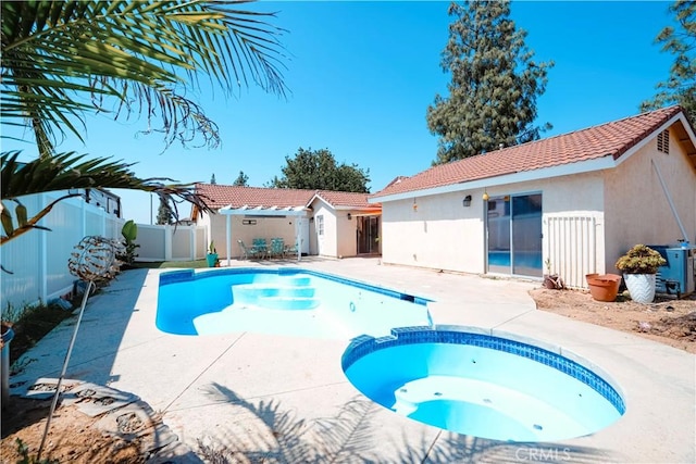 3473 Yankee Cir, Riverside, CA 92503 - view of pool featuring a patio, a fenced backyard, and a pool with connected hot tub