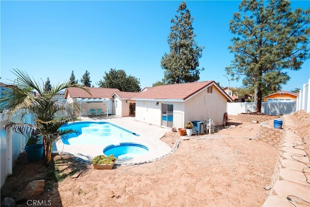 3473 Yankee Cir, Riverside, CA 92503 - view of pool with an in-ground hot tub, a fenced backyard, a storage shed, and a patio