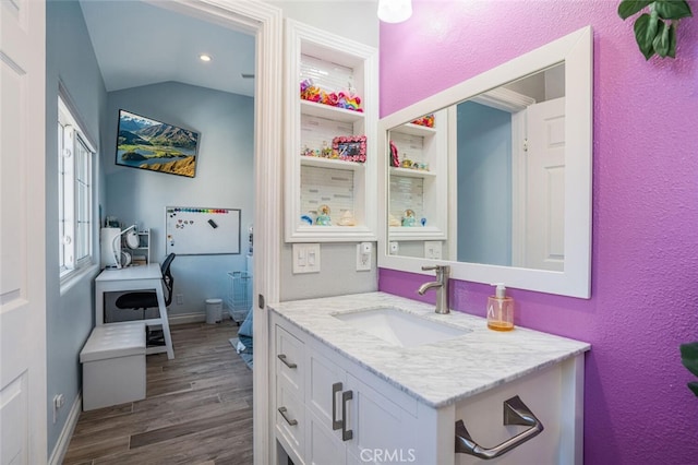 4347 Freedom Dr Unit C, Calabasas, CA 91302 - bathroom featuring wood finished floors, vanity, a textured wall, and recessed lighting