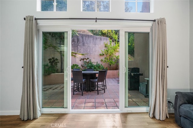 4347 Freedom Dr Unit C, Calabasas, CA 91302 - doorway featuring wood finished floors and baseboards