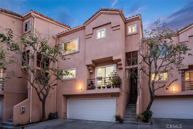 4347 Freedom Dr Unit C, Calabasas, CA 91302 - multi unit property with a garage, concrete driveway, stucco siding, and a tiled roof