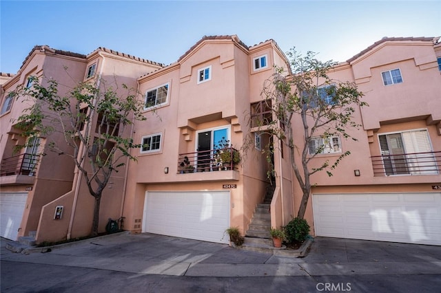 4347 Freedom Dr Unit C, Calabasas, CA 91302 - view of building exterior with a garage and driveway