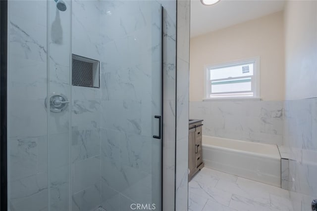 1409 4th St, San Fernando, CA 91340 - full bath with a stall shower, vanity, marble look tiles, and a bath