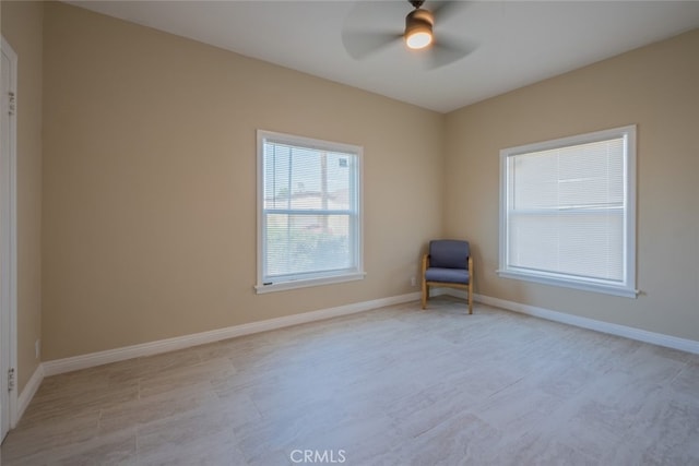 1409 4th St, San Fernando, CA 91340 - spare room featuring ceiling fan and baseboards