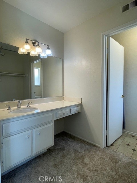 27896 Beacon St, Castaic, CA 91384 - bathroom with vanity and carpet floors