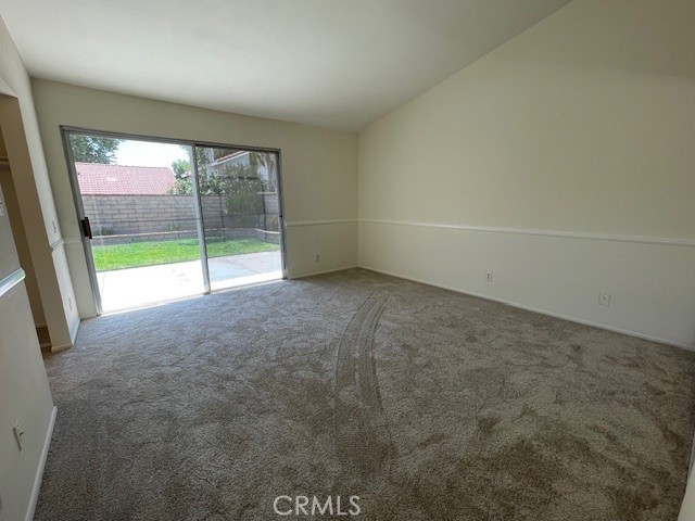 27896 Beacon St, Castaic, CA 91384 - carpeted empty room featuring baseboards