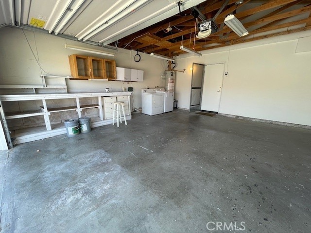 27896 Beacon St, Castaic, CA 91384 - garage with washer and clothes dryer, a garage door opener, and water heater