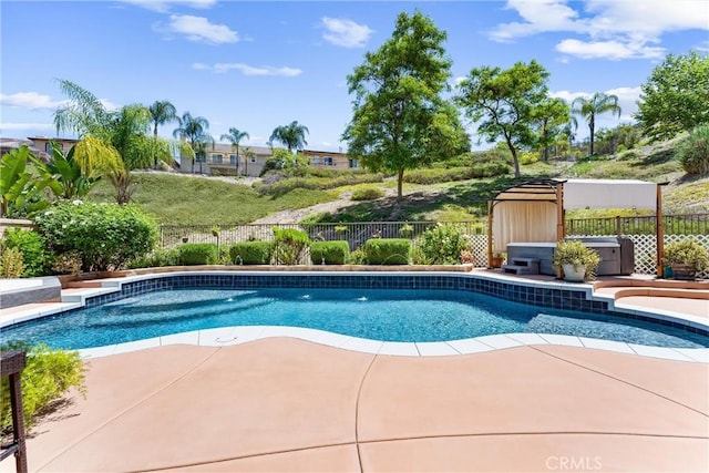 35694 Cherry Bark Way, Murrieta, CA 92562 - view of swimming pool featuring a fenced backyard, a patio area, and a hot tub